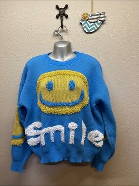 Smile sweater size Large
